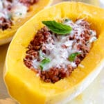 A close up of spaghetti squash with meat sauce
