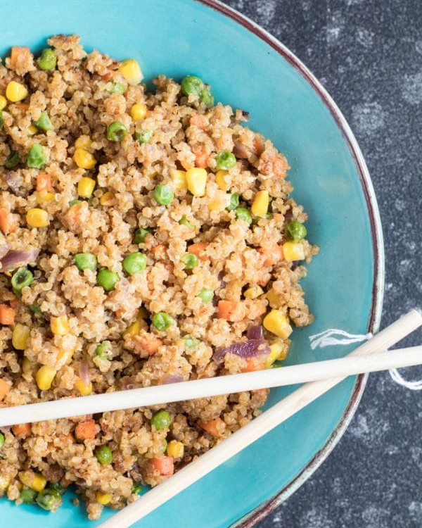 Quinoa Fried Rice is a fun alternative to the typical fried rice and will give you a boost of protein and fiber! Krollskorner.com