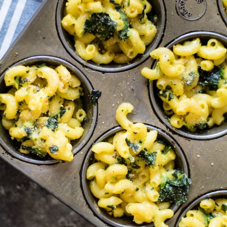 Macaroni and cheese with spinach in cupcake tins for individual portions