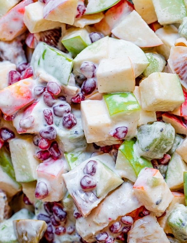 fruit mixed together - pomegranates, blood oranges, apples with greek yogurt dressing