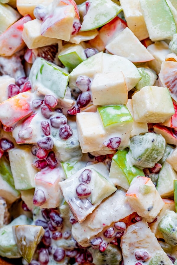 fruit mixed together - pomegranates, blood oranges, apples with greek yogurt dressing