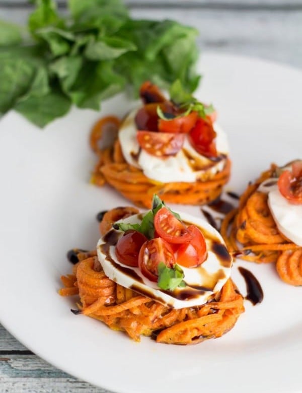 This appetizer is a fun way to incorporate spiralized veggies & an easy way to impress your guests! The combo of fresh mozzarella and basil is always a win! |Krollskorner.com