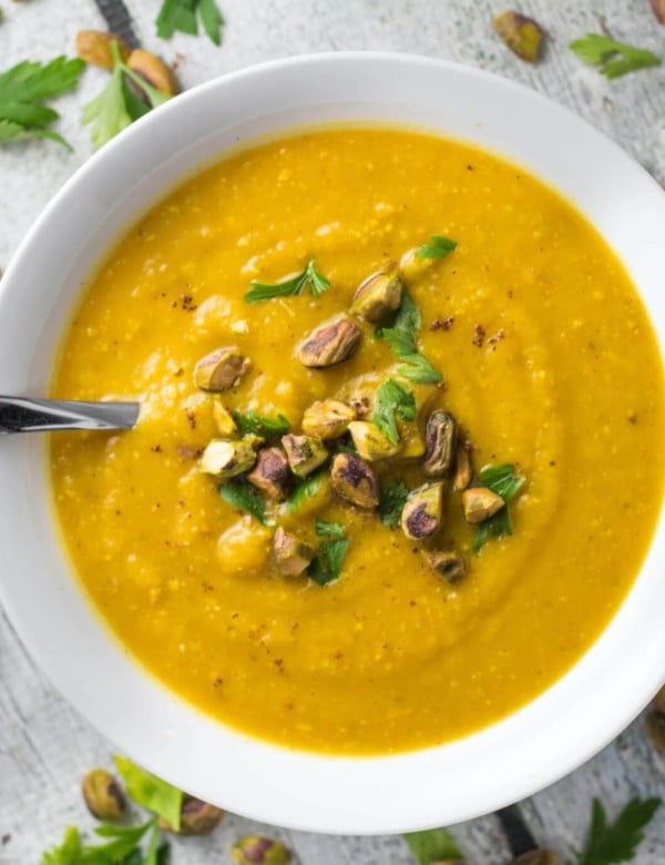 pistachio soup in a white bowl