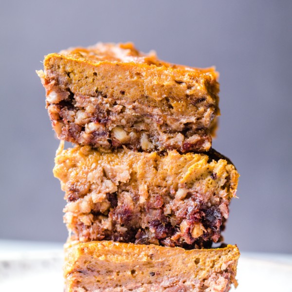 pumpkin pie bars stacked on top of each other