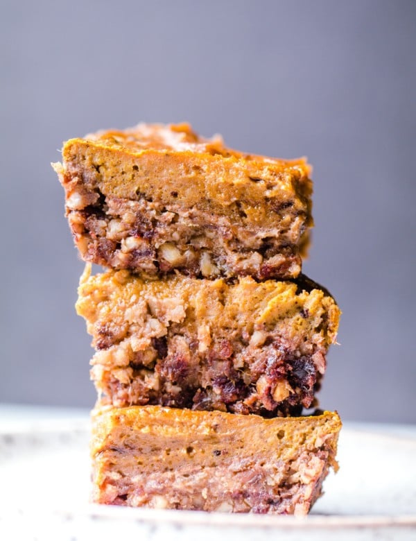 pumpkin pie bars stacked on top of each other