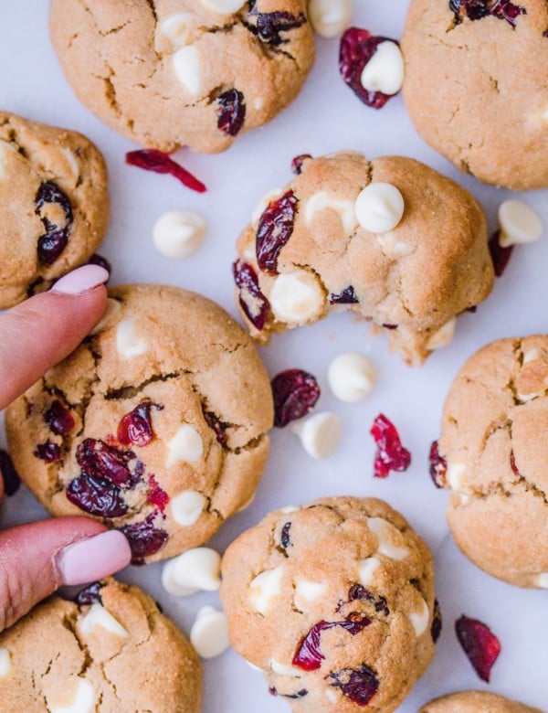 White chocolate cranberry cookies on a marble slab