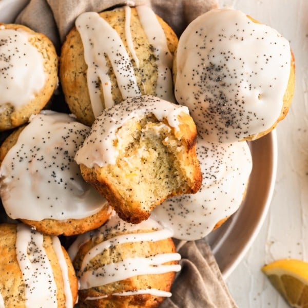 Lemon muffins with poppyseeds and a vanilla glaze.