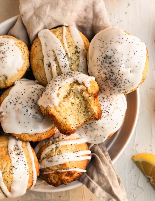 Lemon muffins with poppyseeds and a vanilla glaze.