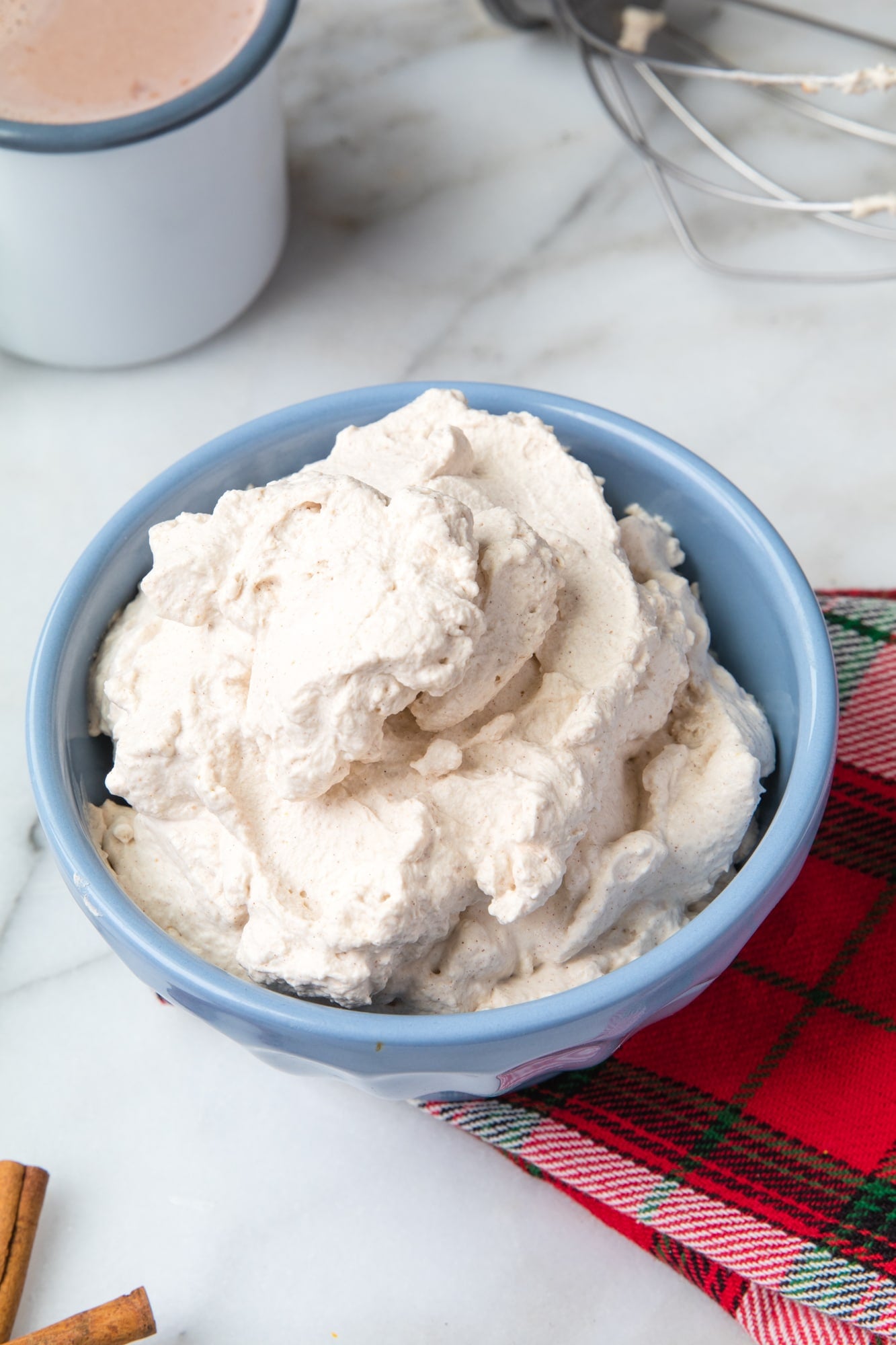 homemade whip cream in a blue bowl