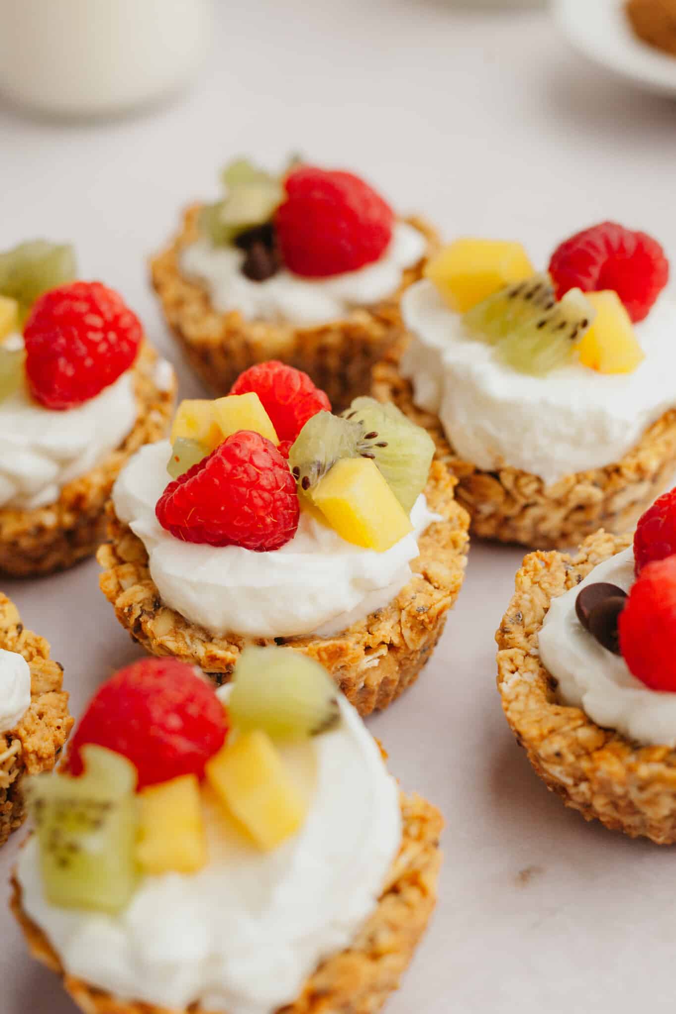 baked oatmeal cup filled with fresh fruit and yogurt.