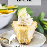 key lime pie on a white plate topped with whipped cream and a lime wedge