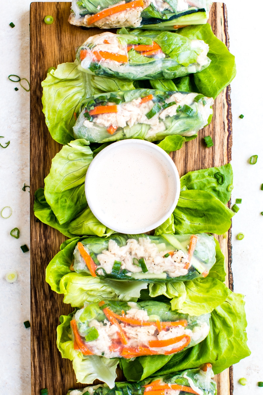 chicken summer rolls on a cutting board