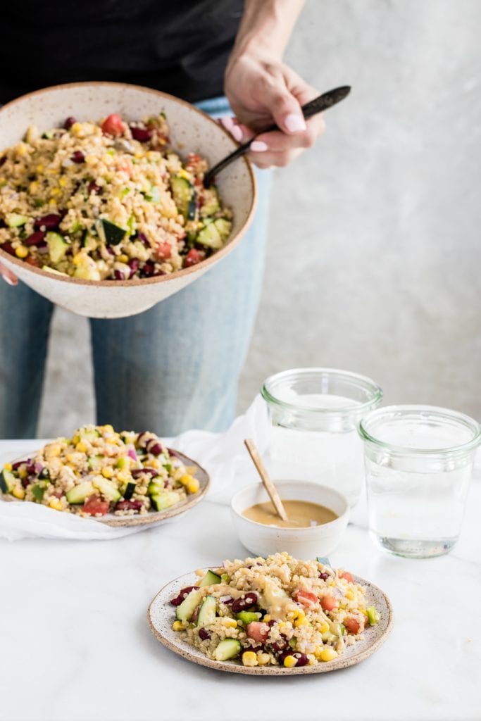 quinoa salad on a grey speckled plate