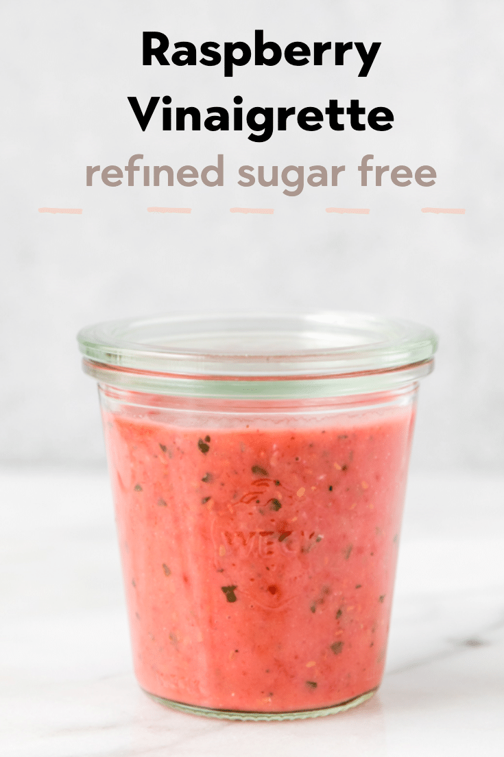 Raspberry Vinaigrette salad dressing in a glass jar.