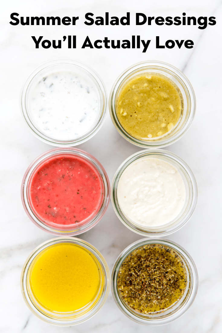 summer salad dressings in glass jars.
