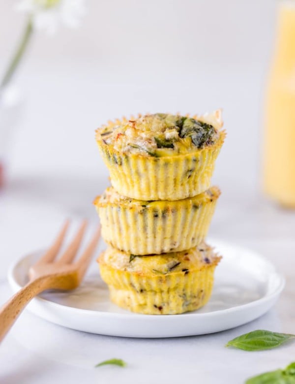 egg muffins stacked on a white plate