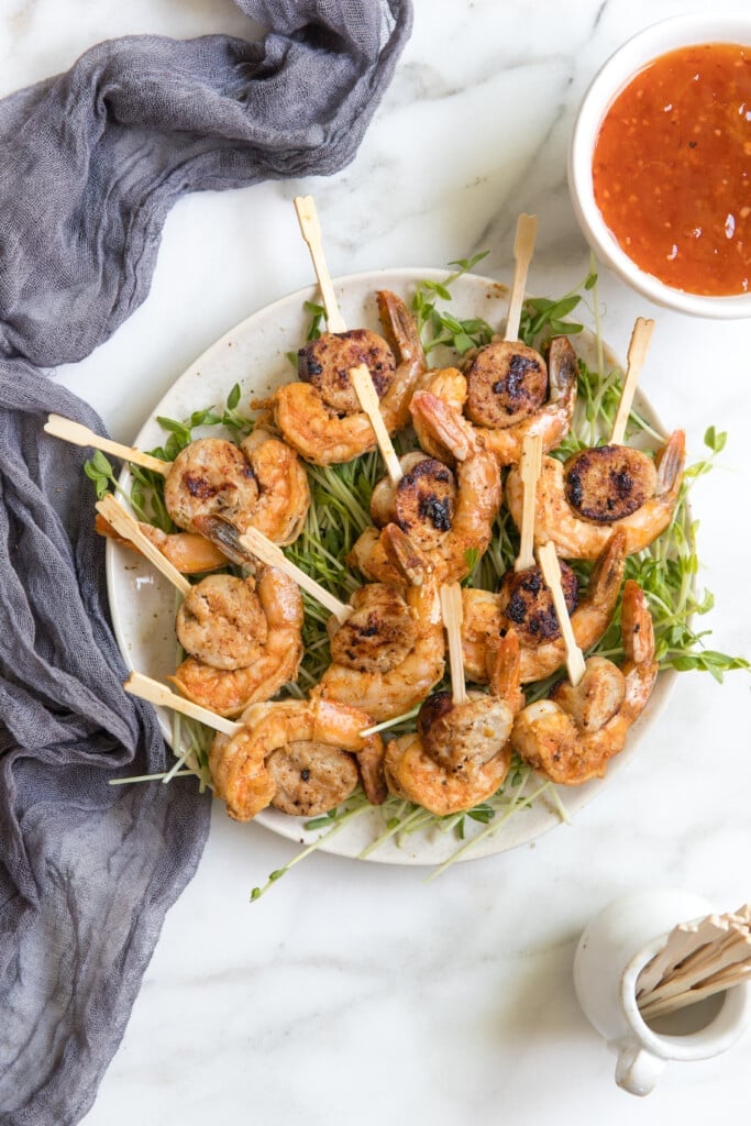 sausage and shrimp on a white plate