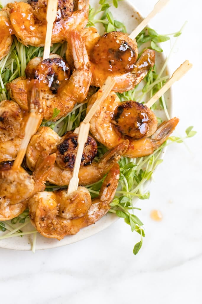 sausage and shrimp on a white plate