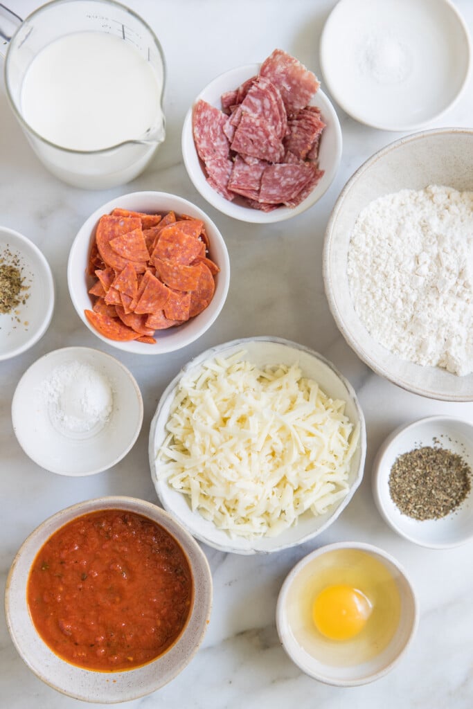 ingredients in glass bowls for Italian Pizza Bites