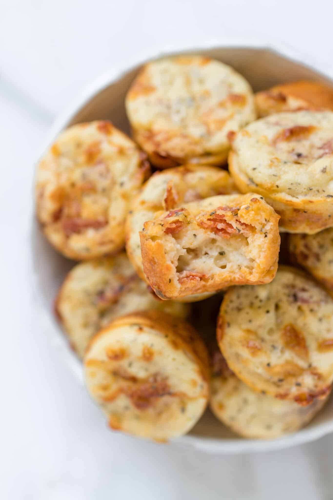 mini italian pizza bites in a white bowl