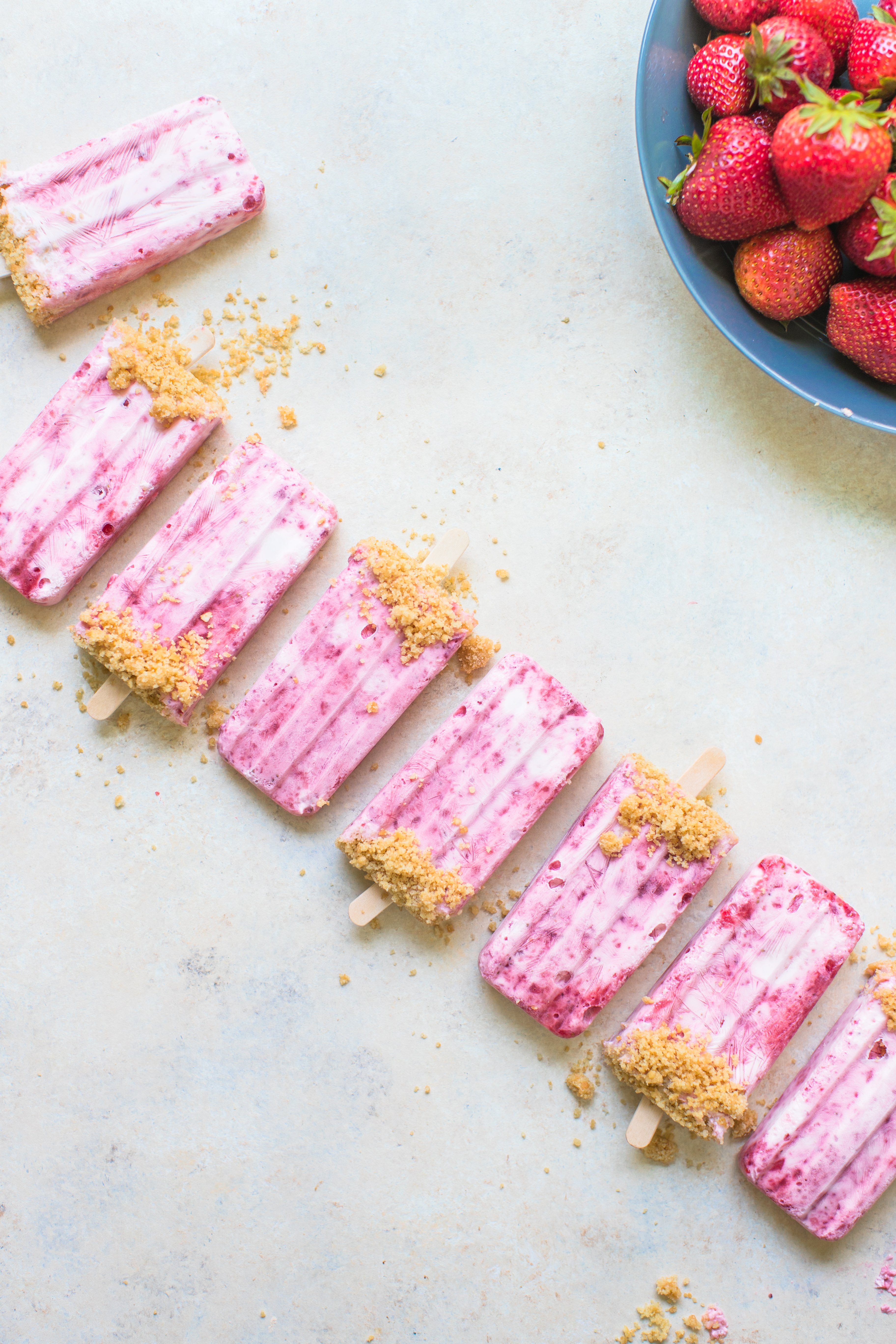 strawberry shortcake popsicles on a white board