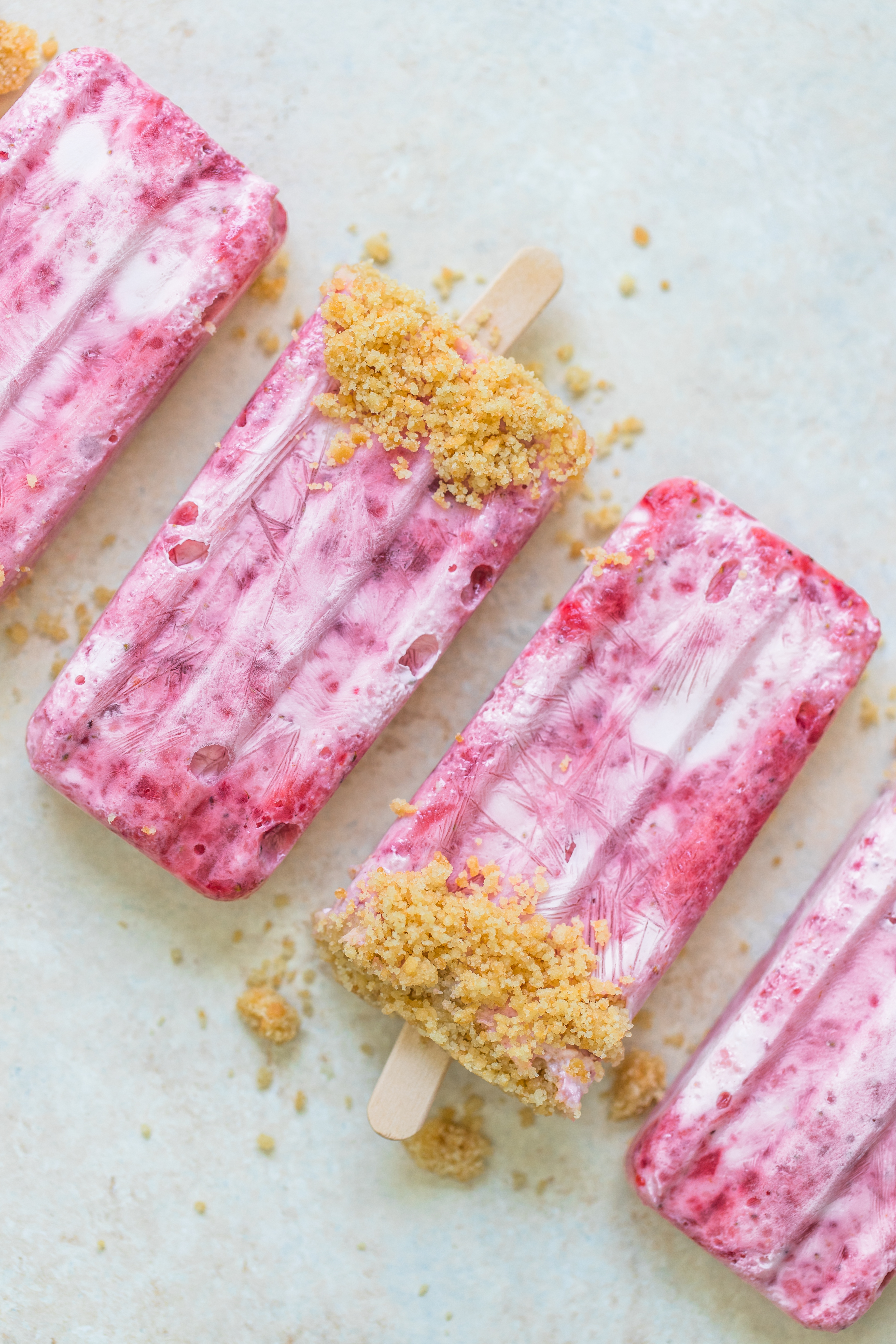 strawberry shortcake popsicles on a white board