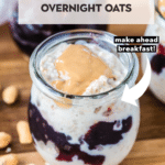 overnight oats in a glass jar topped with peanut butter
