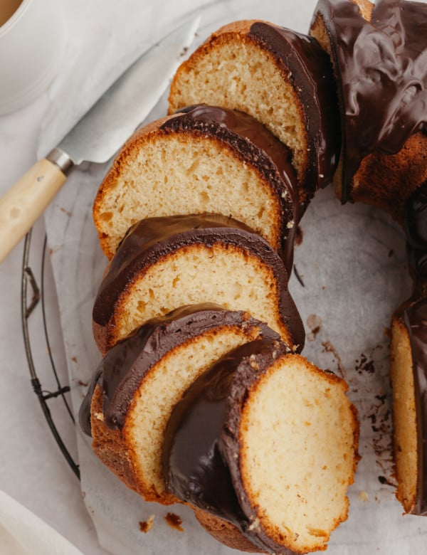 slices of rum bacardi bundt cake with chocolate ganache.