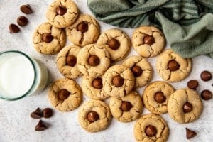 multiple almond butter blossom cookies on a countertop