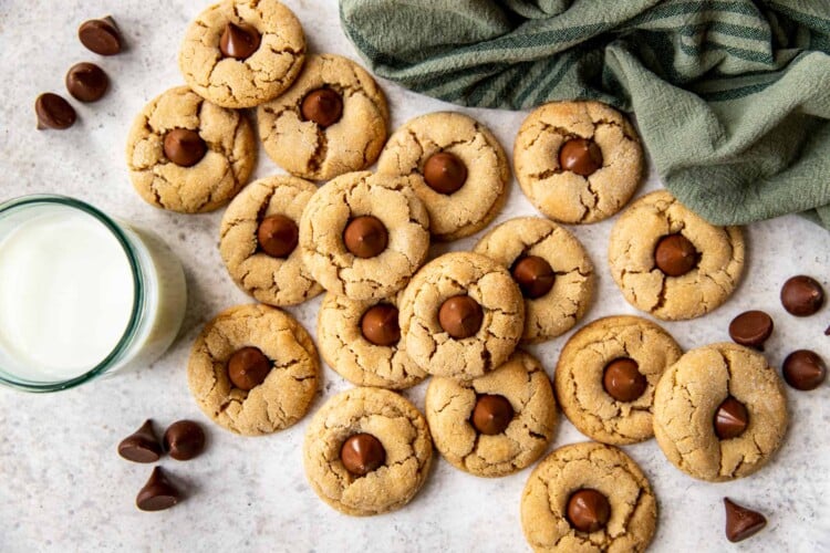 multiple almond butter blossom cookies on a countertop
