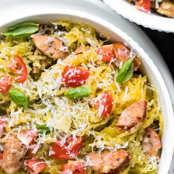 spaghetti squash with pesto in a white bowl
