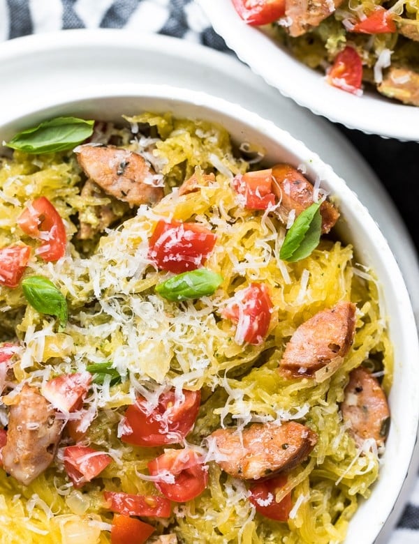 spaghetti squash with pesto in a white bowl