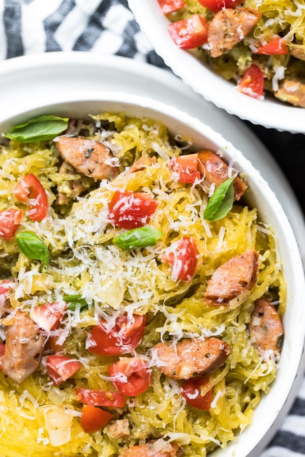 spaghetti squash with pesto in a white bowl