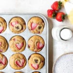 strawberry banana muffins in a muffin tin