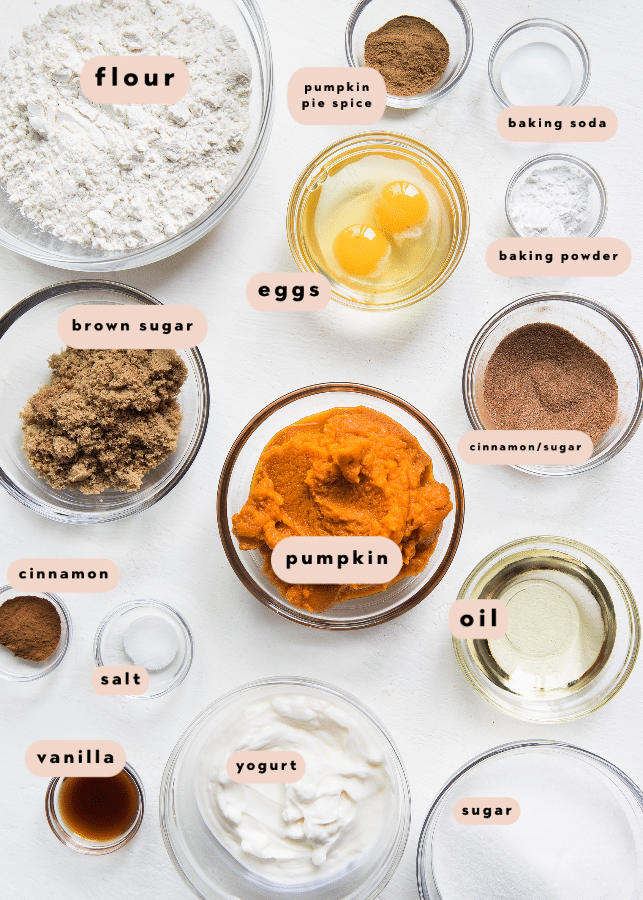 all of the ingredients needed for pumpkin muffins in glass bowls