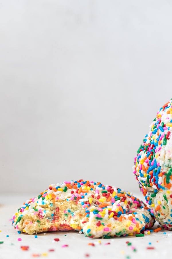 funfetti cookies coated in rainbow sprinkles