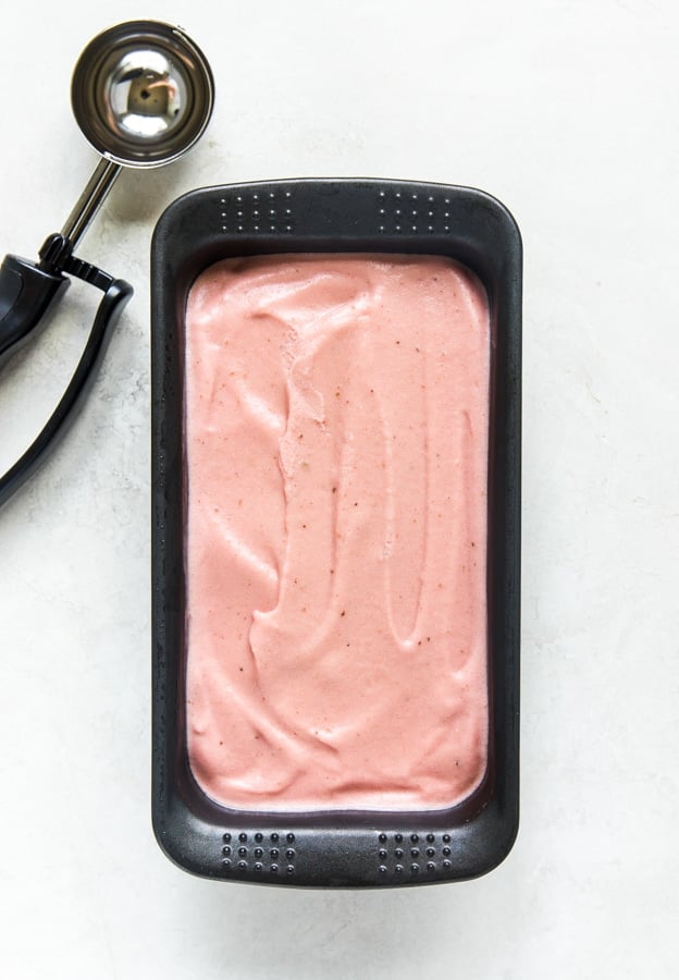 pomegranate nice cream in a loaf pan