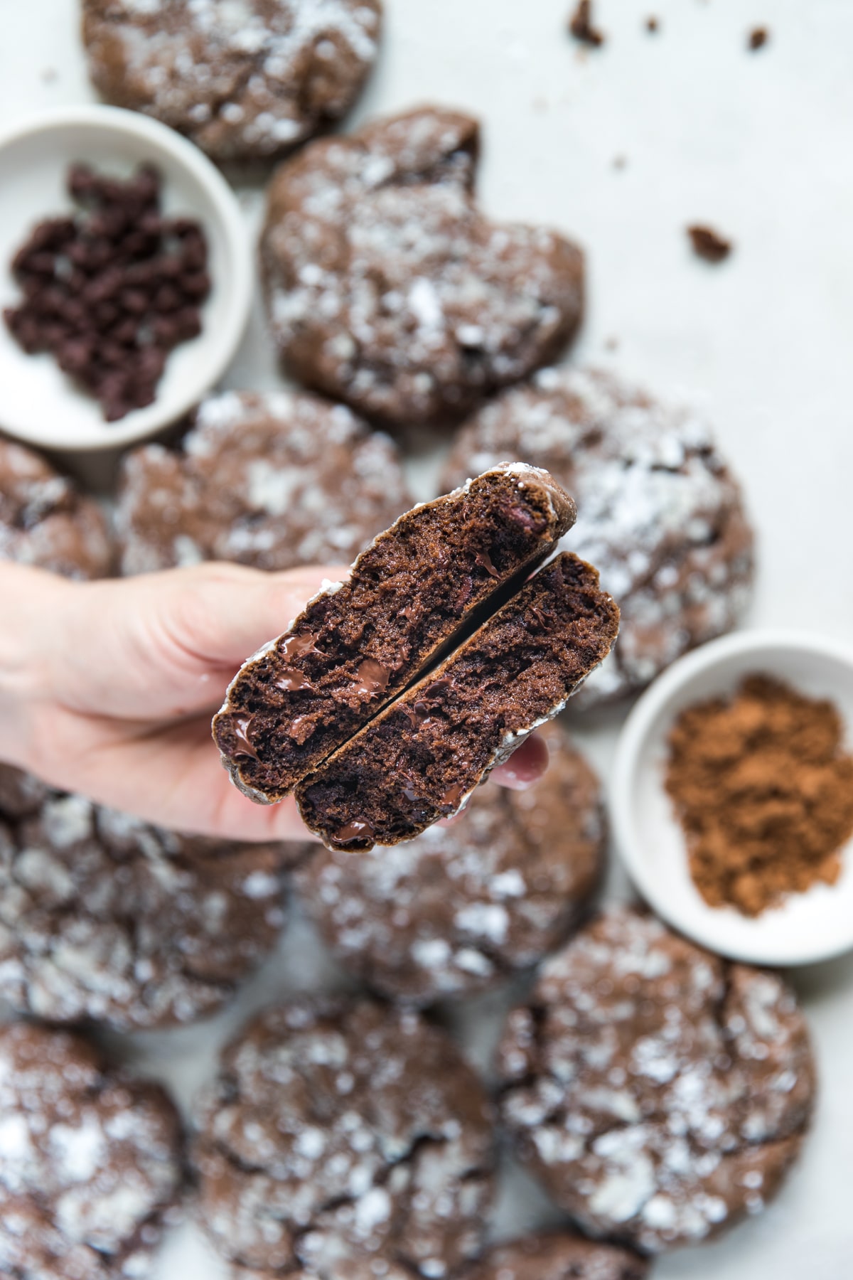A close up of a chocolate crinkle cookie