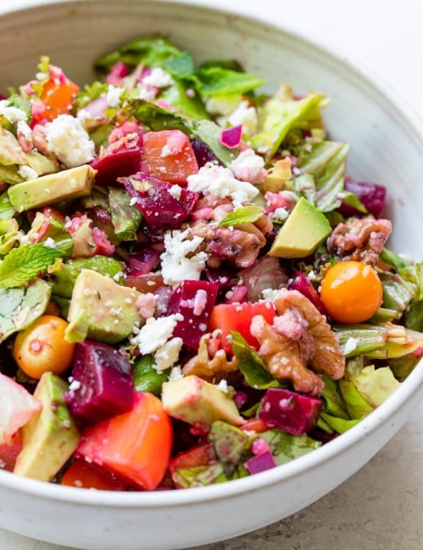 beet salad in a bowl topped with feta