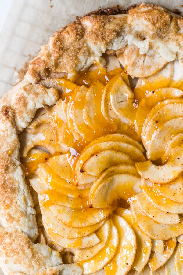 an apple galette on parchment paper