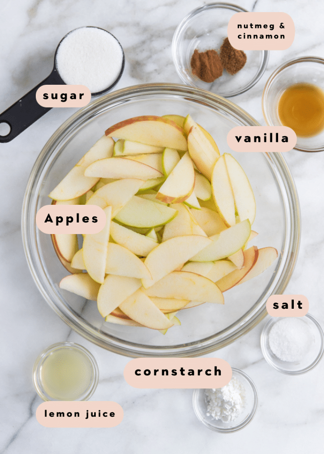 sliced apples in a glass bowl
