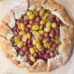 grape galette on parchment paper