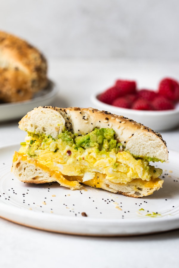 a breakfast sandwich on a white plate