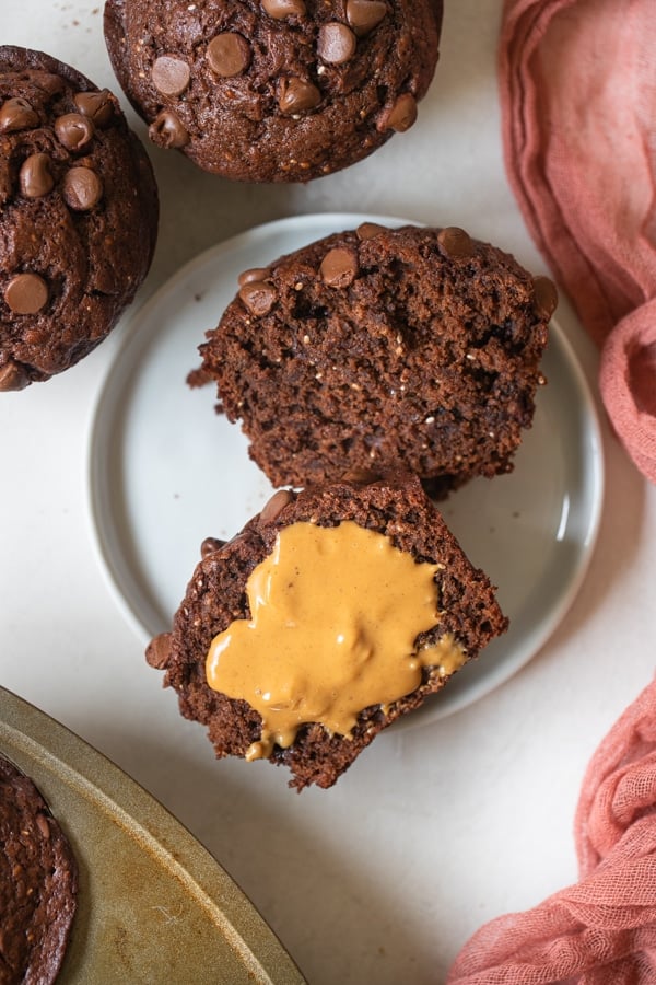 chocolate banana muffins with peanut butter on top