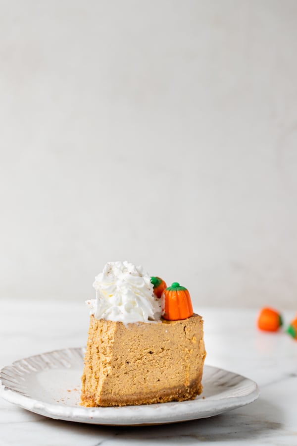 pumpkin cheesecake on a white plate