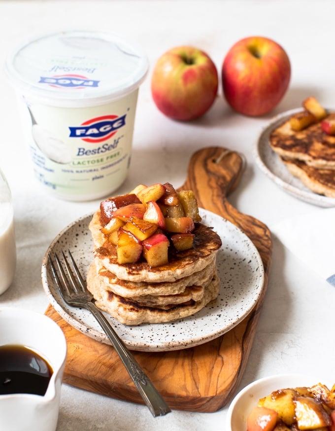 pancakes on a plate with apples on top