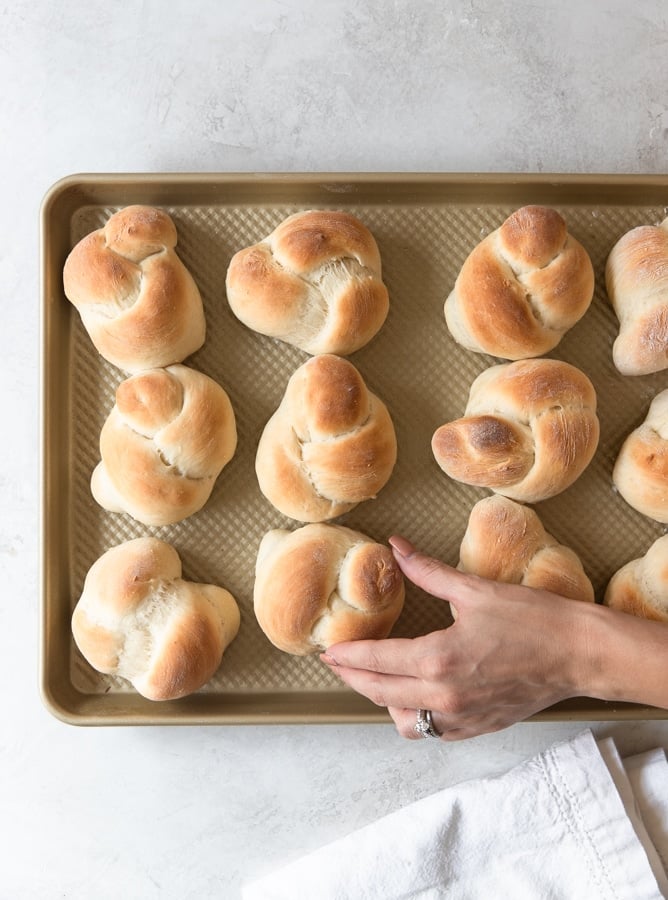 sweet dinner rolls on a baking sheet