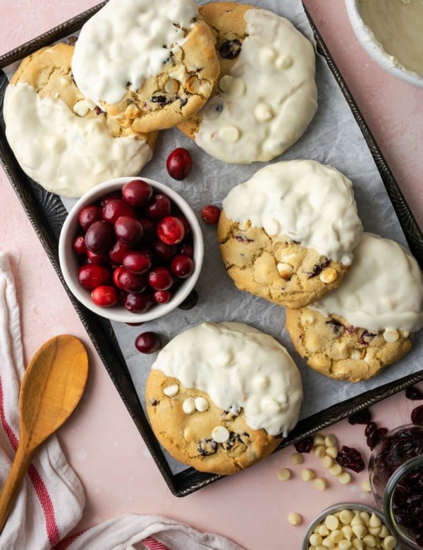 cookies on parchment paper dipped in white chocolate