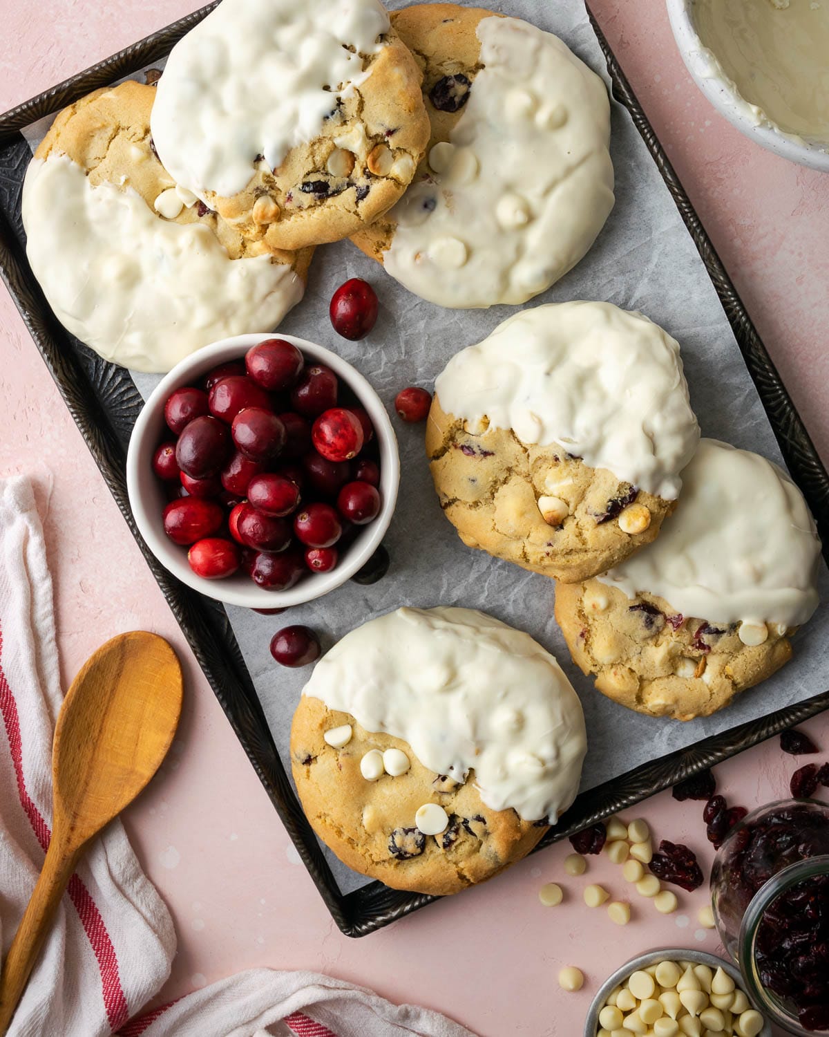 cookies on parchment paper dipped in white chocolate