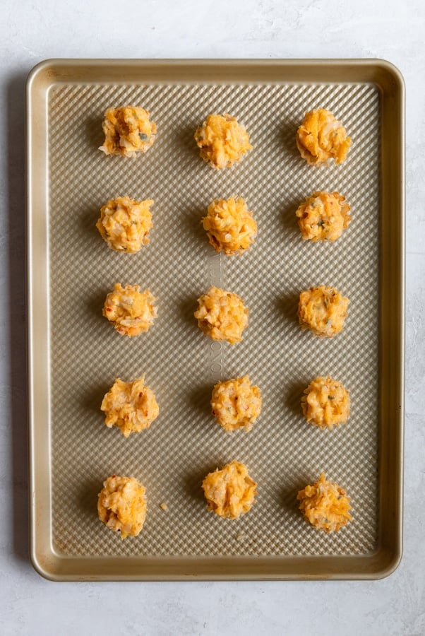 phyllo cups filled with butternut squash on a baking sheet